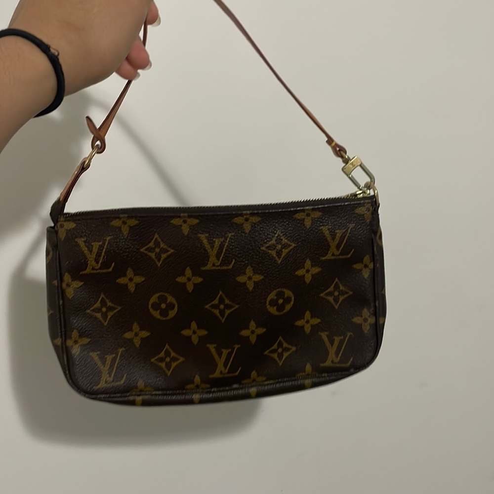 Louis Vuitton mini purse.